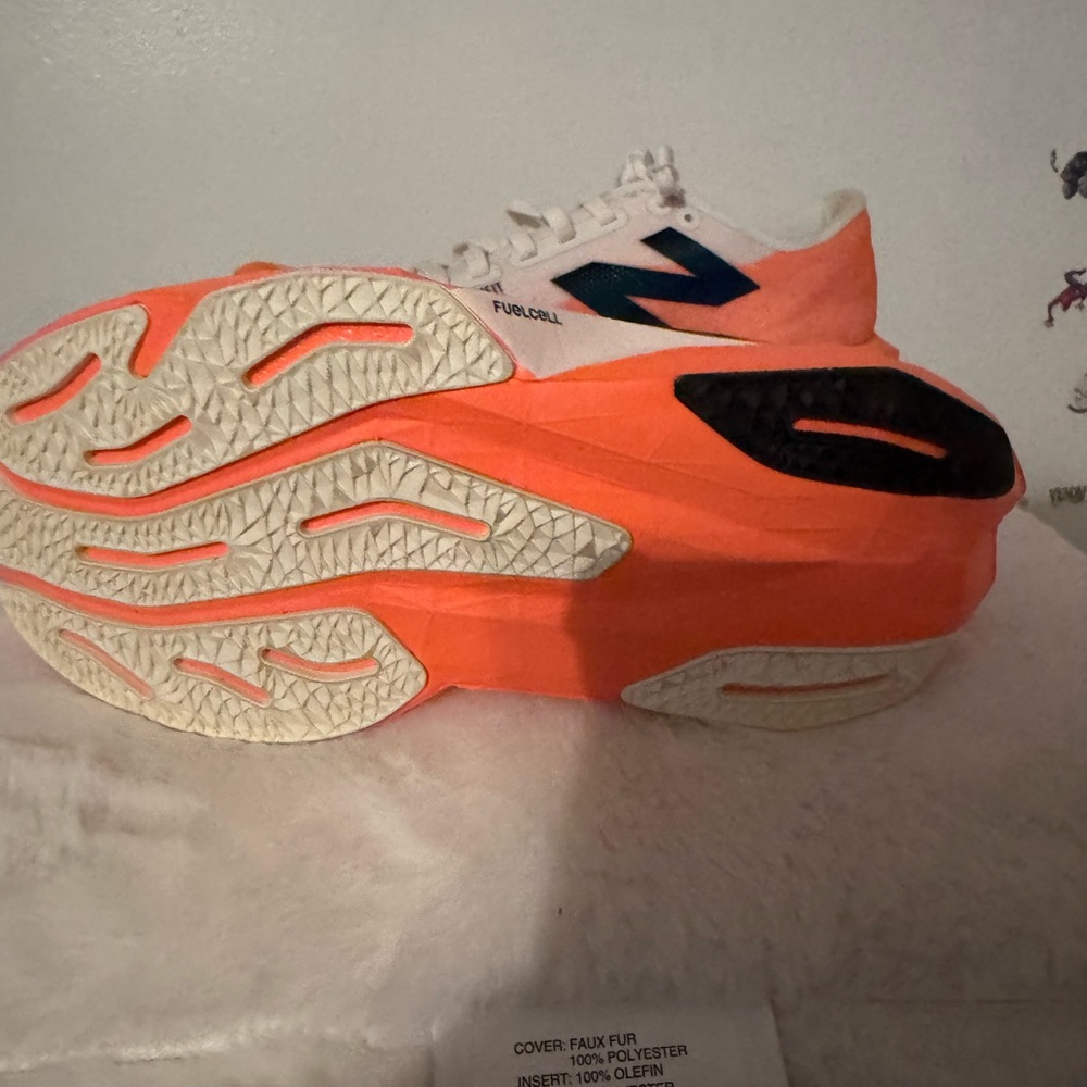 New Balance Orange and White Running Shoe with Navy Logo